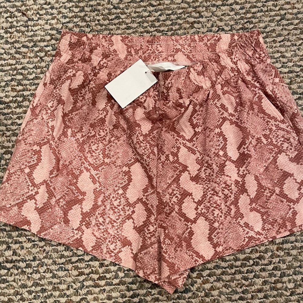 Women’s shorts Size Small with pockets in front - NEW WITH TAGS